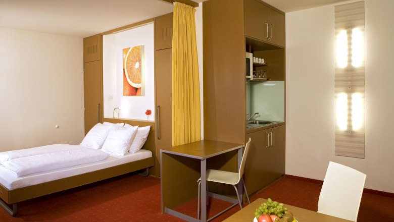 Orange Wings Apartmánový izba, © Orange Wings/ Wiener Neustadt Orange Wings Apartmánový izba, © Orange Wings/ Wiener Neustadt