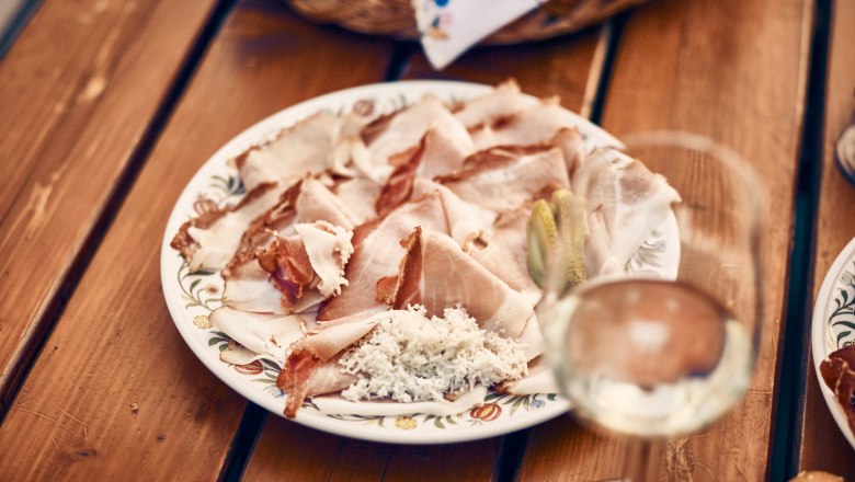 Enjoy culinary delights at a wine tavern, &copy; Andreas Hofer