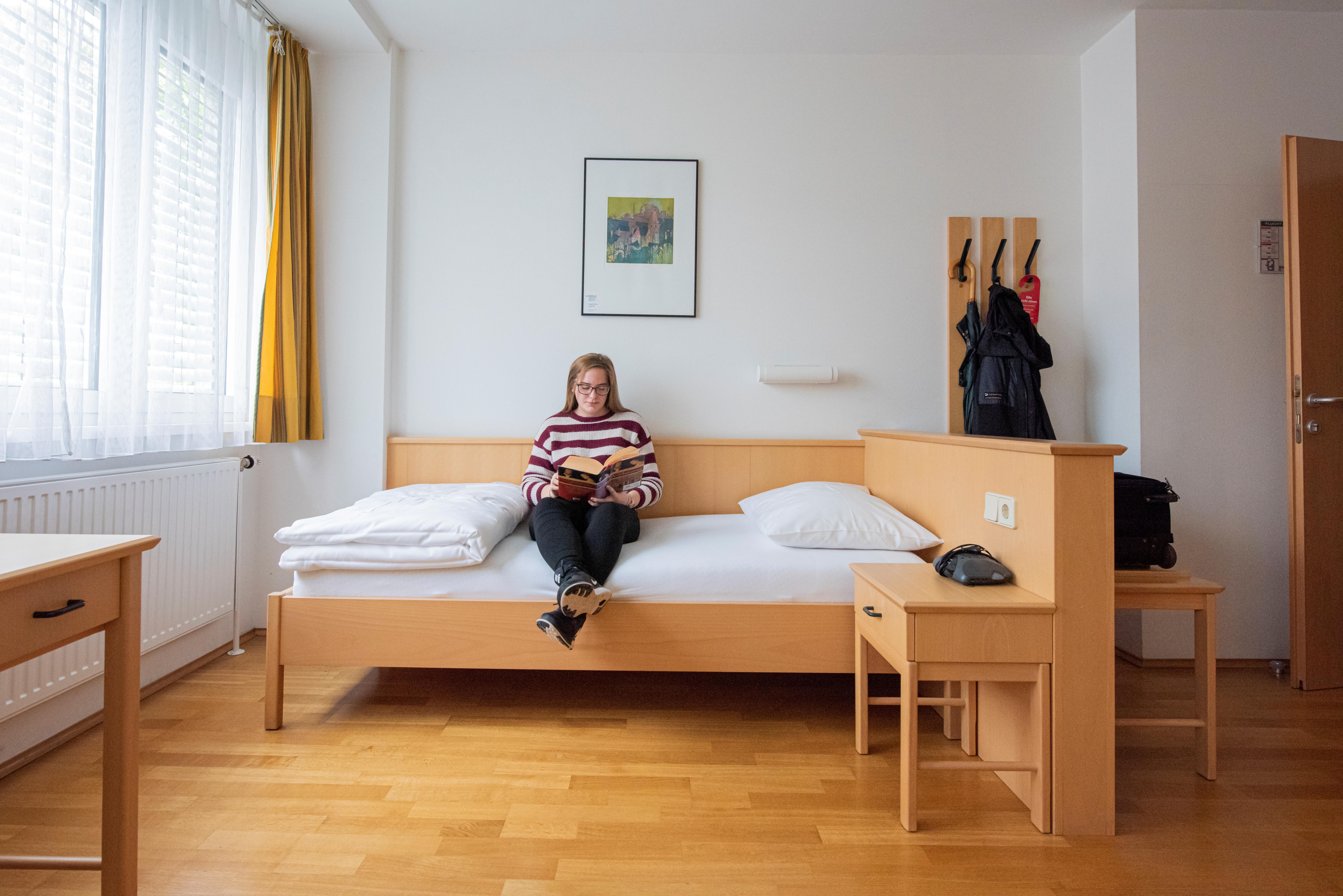 EZ mit Mensch auf Bett_